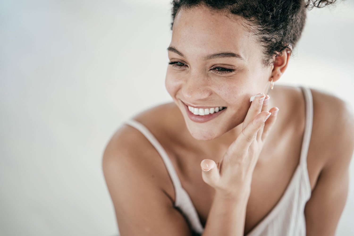 Woman Enjoys Results of Natural Skincare from Dr. Duplechain in Lafayette