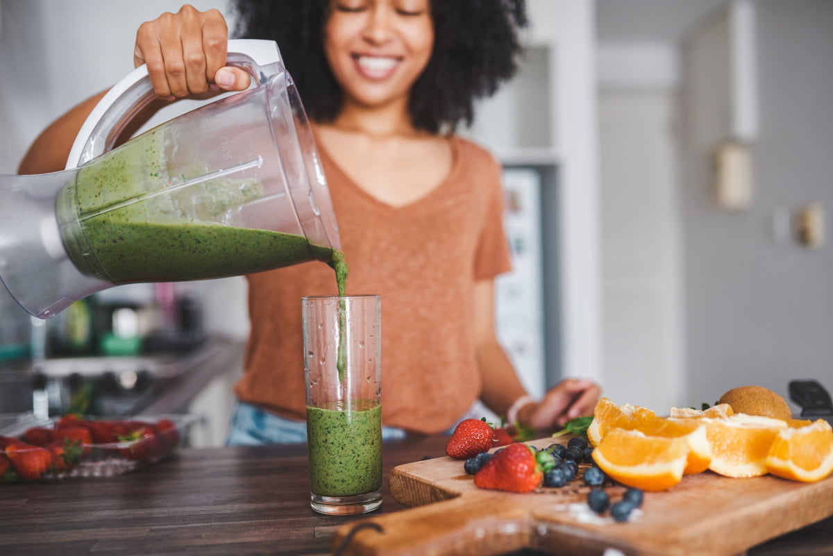 Woman Enjoys Healthy Superfood Smoothie
