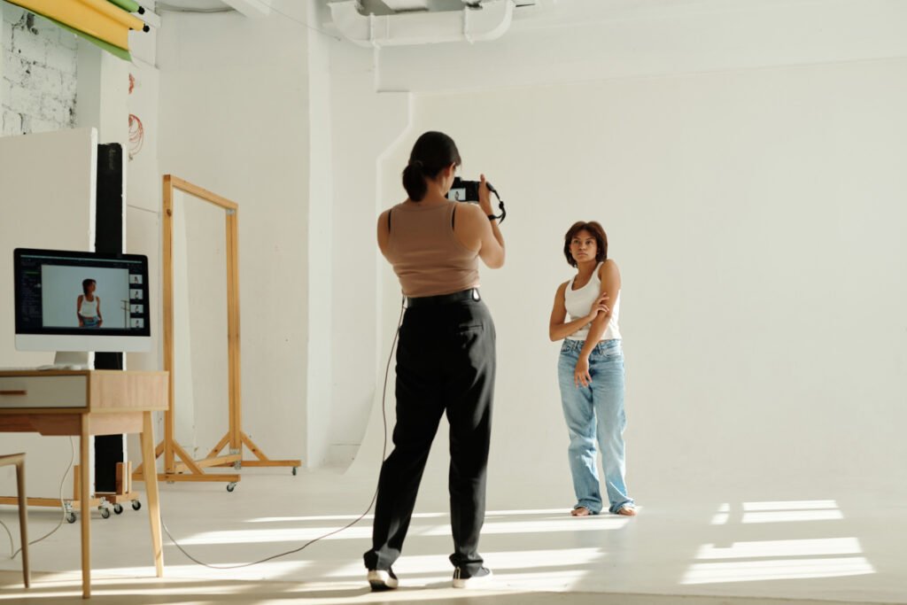 Woman having her photo taken by a portrait photographer