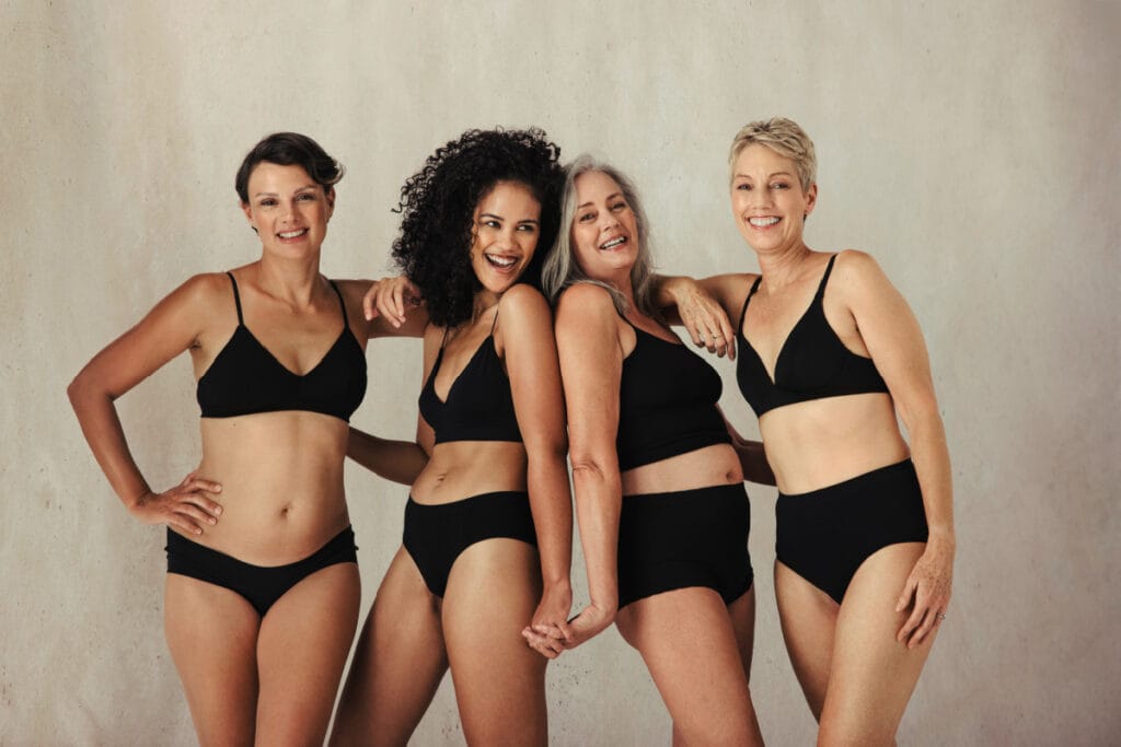 Group of diverse women in black underwear